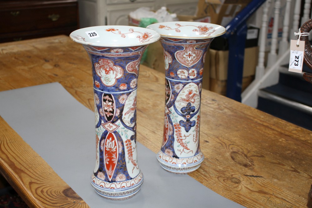 A near pair of Imari trumpet vases, decorated with birds and flowers, height 39.5cm
